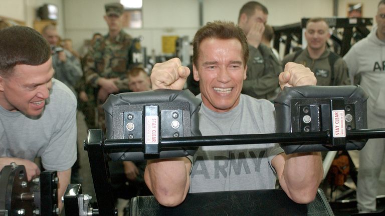 Arnold Schwarzenegger working out