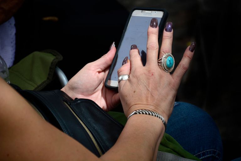 https://www.gettyimages.com/detail/news-photo/woman-uses-her-samsung-smartphone-in-santa-fe-new-mexico-news-photo/839985882?phrase=woman%20phone%20call