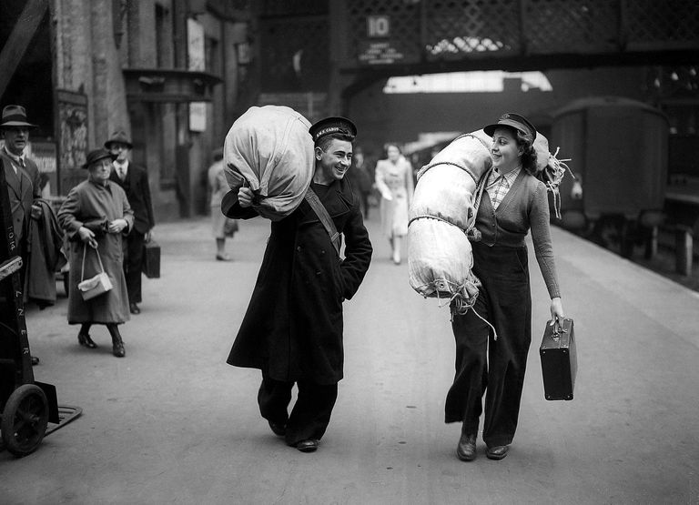 https://www.gettyimages.co.uk/detail/news-photo/railway-porters-on-the-station-platform-carrying-luggage-news-photo/1450432552 railway porters