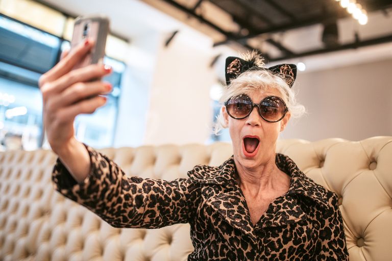 https://www.gettyimages.co.uk/detail/photo/stylish-and-quirky-senior-woman-at-restaurant-royalty-free-image/872638036 stylish quirky senior