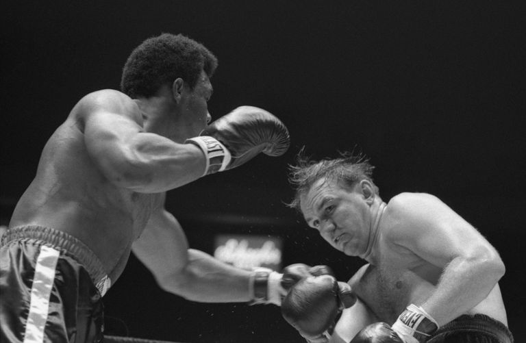 https://www.gettyimages.co.uk/detail/news-photo/george-foreman-makes-a-long-left-jab-at-chuck-wepner-in-the-news-photo/51511757004 George Foreman Chuck Wepner