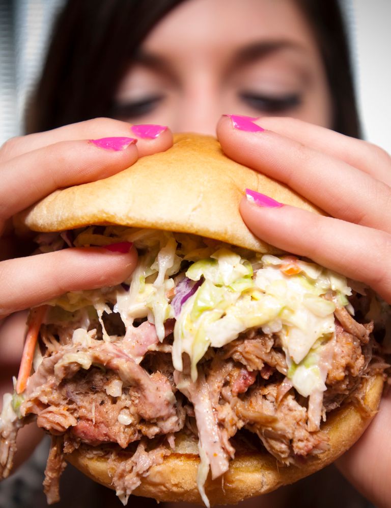 https://www.gettyimages.co.uk/detail/news-photo/hands-holding-pulled-pork-sandwich-news-photo/1265287854?phrase=Pulled%20pork
