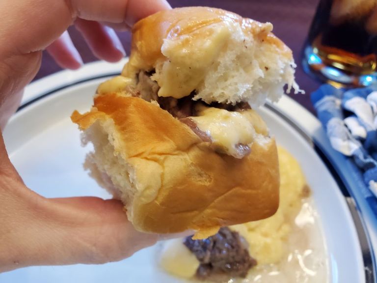 https://www.gettyimages.co.uk/detail/news-photo/persons-hand-holding-a-small-cheesesteak-slider-lafayette-news-photo/1352068087?phrase=Slider%20sandwich