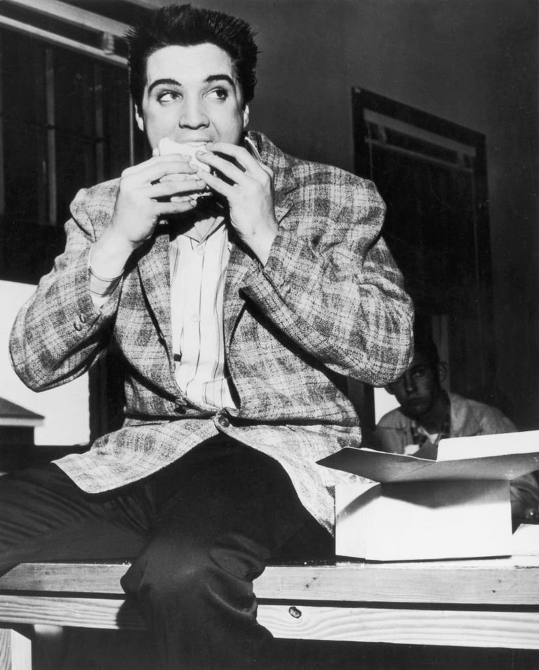 https://www.gettyimages.co.uk/detail/news-photo/american-singer-and-actor-elvis-presley-sitting-on-a-bench-news-photo/3239329?phrase=Elvis%20sandwich&adppopup=true