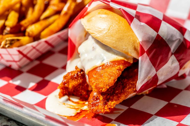 https://www.gettyimages.co.uk/detail/news-photo/buffalo-fried-chicken-sandwich-with-house-cut-fries-at-news-photo/1212829416?phrase=Buffalo%20chicken%20sandwich