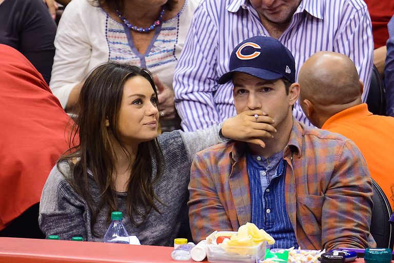 https://www.gettyimages.co.uk/detail/news-photo/mila-kunis-and-ashton-kutcher-attend-a-basketball-between-news-photo/480108035