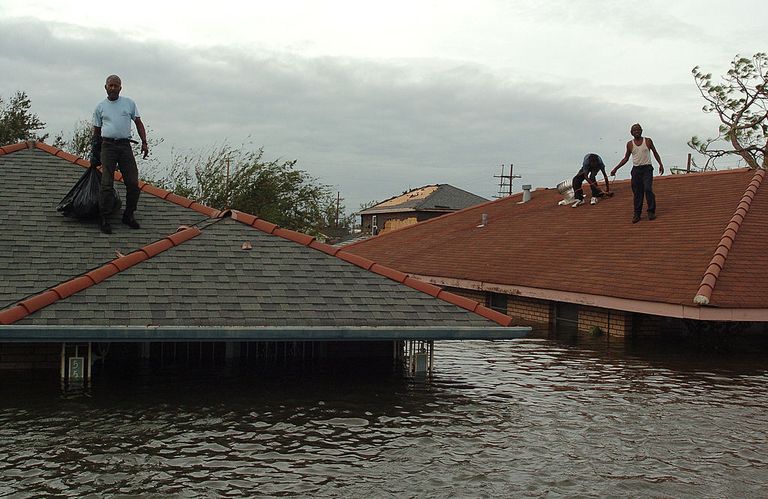 https://www.gettyimages.com/detail/news-photo/lower-ninth-ward-residents-stranded-on-the-roofs-wait-for-a-news-photo/55320242?phrase=hurricane%20katrina%20roof&adppopup=true