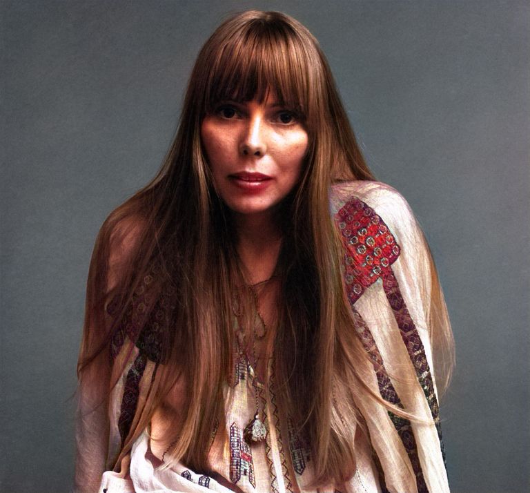 https://www.gettyimages.co.uk/detail/news-photo/portrait-of-canadian-musician-joni-mitchell-wearing-a-loose-news-photo/474080437?phrase=joni%20mitchell&adppopup=true