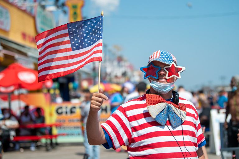 https://www.gettyimages.co.uk/detail/news-photo/person-wearing-american-flag-clothing-poses-on-the-news-photo/1254292880