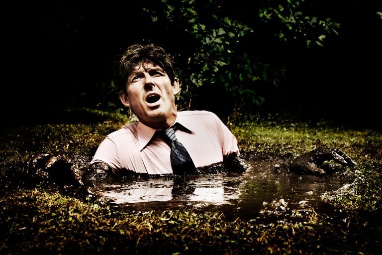 https://www.gettyimages.co.uk/detail/photo/businessman-sinking-in-a-mud-hole-royalty-free-image/95764198?phrase=Businessman+sinking+in+a+mud+hole