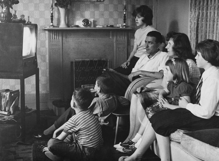 https://www.gettyimages.com/detail/news-photo/family-watching-television-together-at-their-home-in-news-photo/1262909251