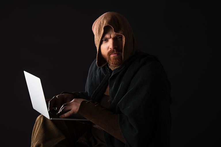 https://www.gettyimages.com/detail/photo/frowning-medieval-scottish-man-in-mantel-using-royalty-free-image/1235640380?phrase=medieval+man+on+computer&adppopup=true