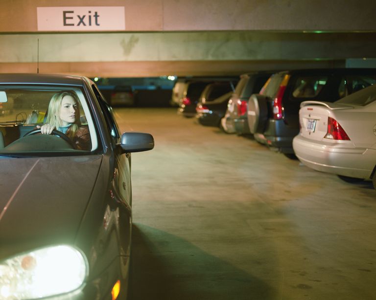 https://www.gettyimages.com/detail/photo/young-woman-driving-car-in-parking-garage-royalty-free-image/200173820-001?phrase=woman+in+parking+lot&adppopup=true